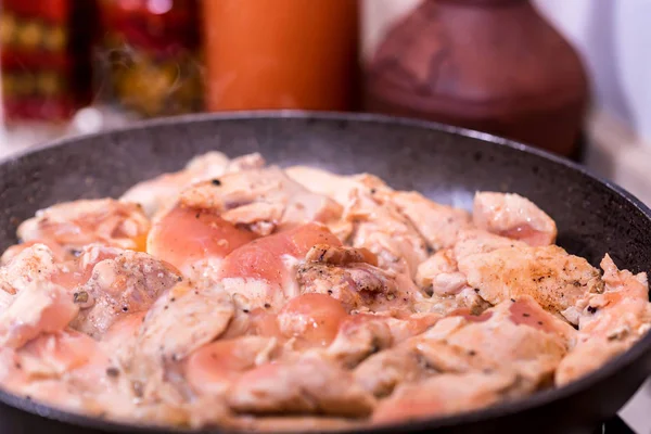 Close up chicken fillet on frying pan — Stock Photo, Image