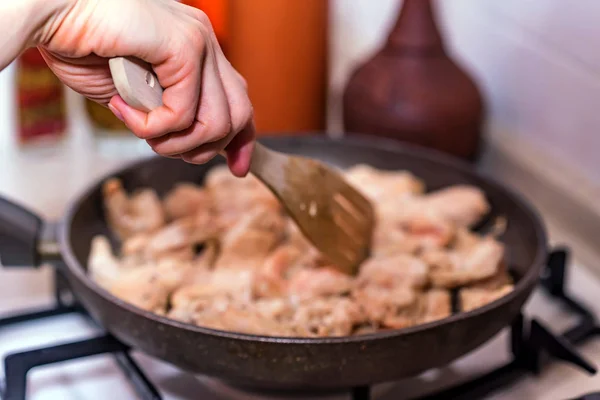 Cooking chicken fillet on frying pan — Stock Photo, Image