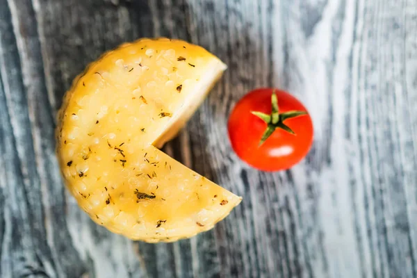 Cheese head and tomato look like Pacman — Stock Photo, Image