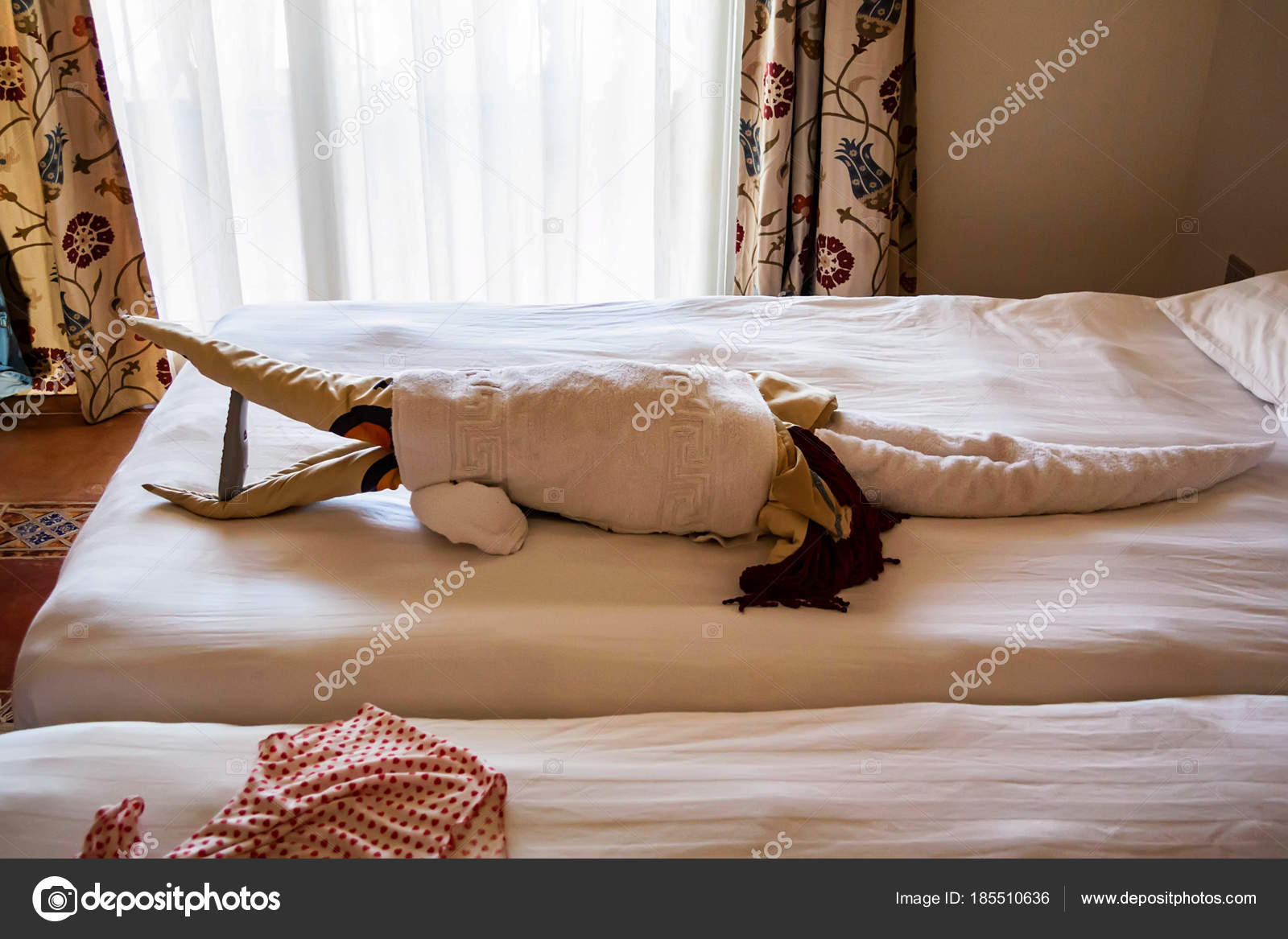 Crocodile Towel For Welcome Gift Folded Towel Stock Photo