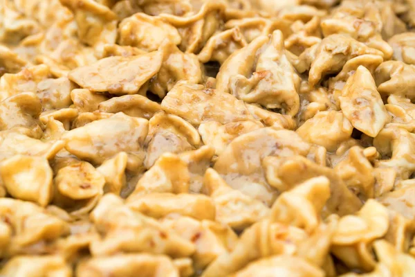 Close-up van vlees knoedels of pelmeni — Stockfoto