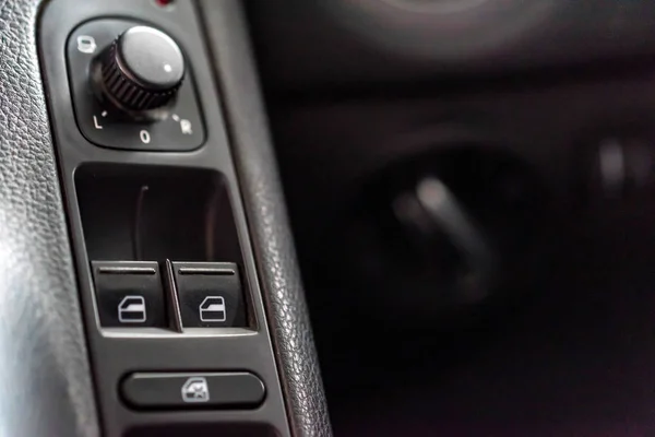 Window lifter and mirror adjustment buttons in car — Stock Photo, Image