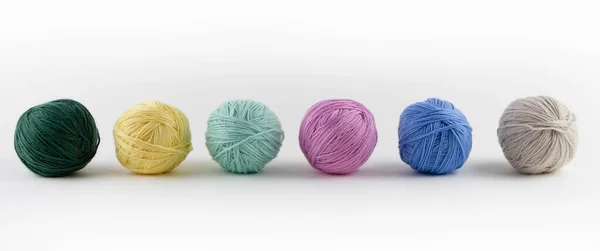 Colored balls of yarn on a white background. — Stock Photo, Image