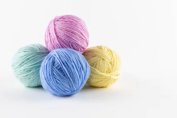 Colored balls of yarn on a white background. — Stock Photo, Image