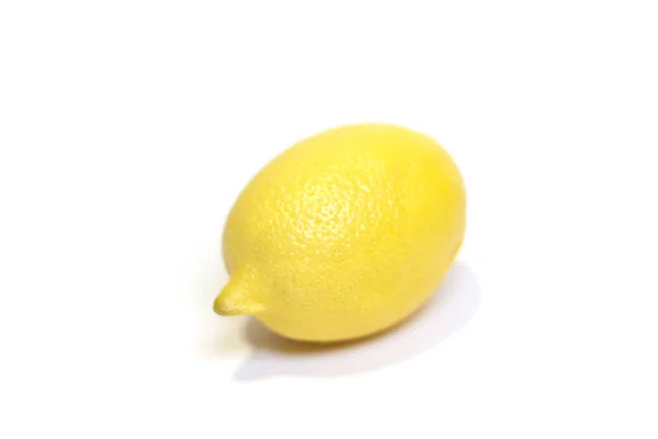 Yellow lemon on the white background. — Stock Photo, Image