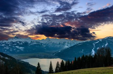 colorful sunset at the Zell am See clipart