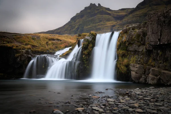 Kirkjufell mountain, Iceland. Beautiful sunset over icelandic la — Stock Fotó