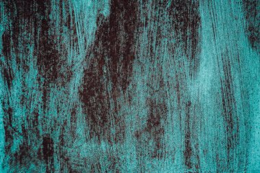 Eski model çizgili beton mavi duvar. Soğuk metal arka plan paslı ve neon renkleri grunge tarzında. Üst Manzara. Atış masasının yüzeyi düz yatıyordu. Boşluğu kopyala