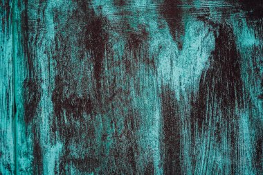 Eski model çizgili beton mavi duvar. Soğuk metal arka plan paslı ve neon renkleri grunge tarzında. Üst Manzara. Atış masasının yüzeyi düz yatıyordu. Boşluğu kopyala