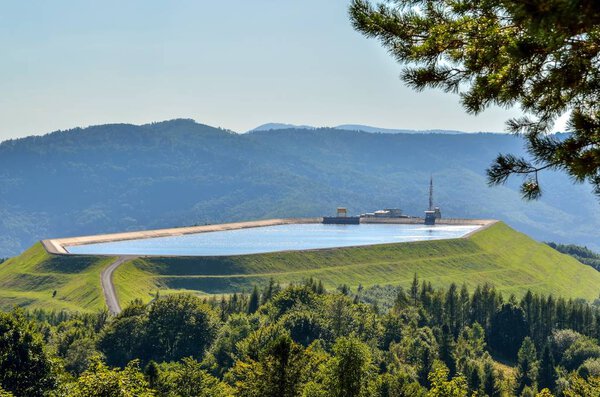 Water power plant at the top of the mountain. Summer mountain landscape in Poland.