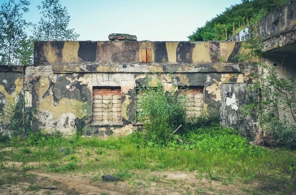 Old abandoned building. Destroyed building after a military unit.