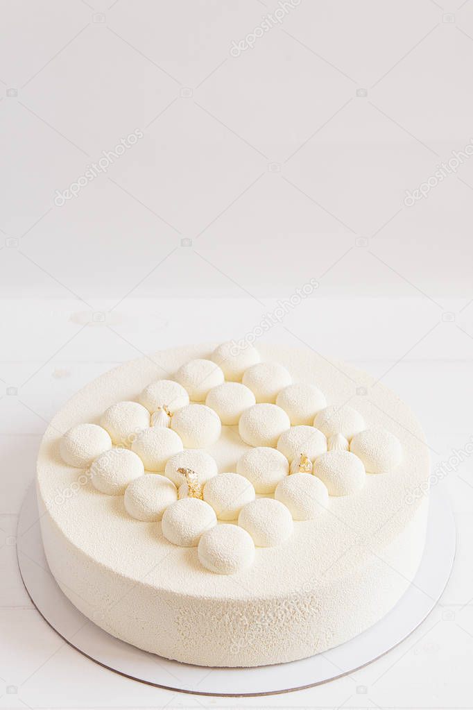 White wedding cake on white background