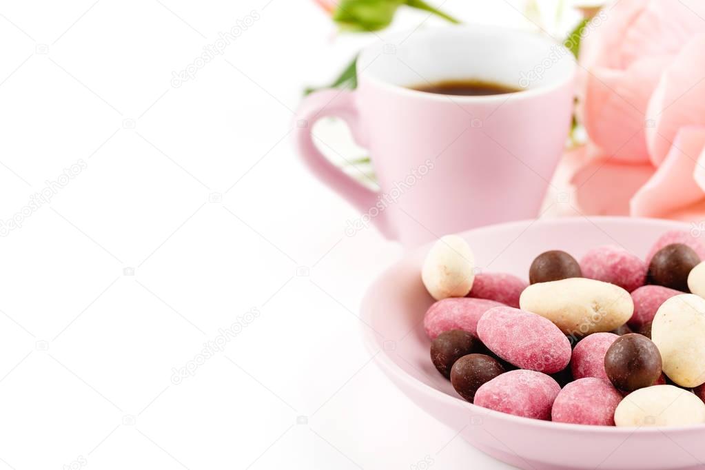 Valentines day background with handmade candies and pink cup of 