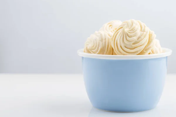 Homemade white zephyr or marshmallow on blue bowl — Stock Photo, Image