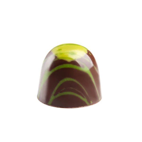 Chocolate doce artesanal de luxo com salpicos verdes isolados em — Fotografia de Stock