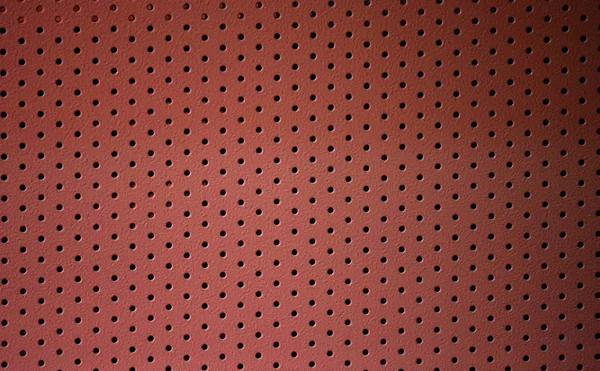 Dotted pink metal wall pattern