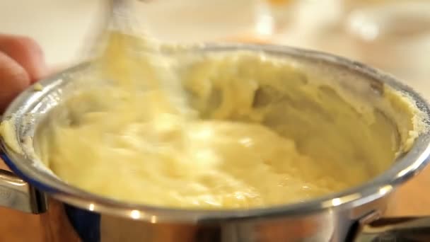 Mashing potatoes in stainless steel saucepan — Stock Video