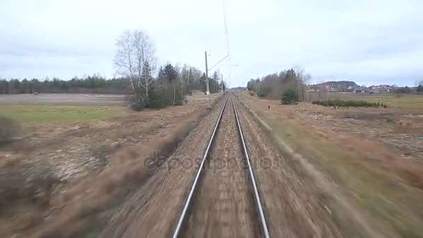 Railroad track running through coutry landscapes — Stock Video