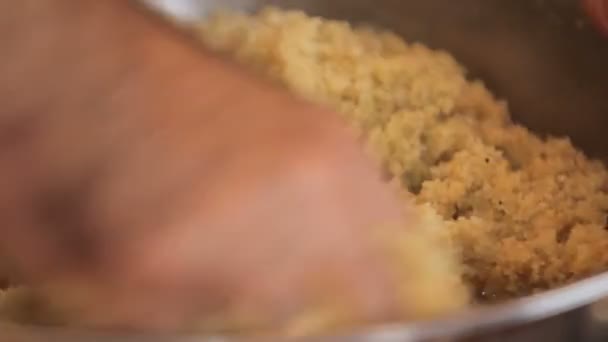 Kneading grainy dough for breading — Stock Video