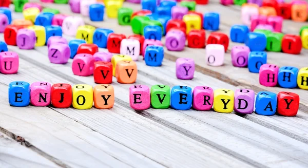 Enjoy everyday words on table — Stock Photo, Image