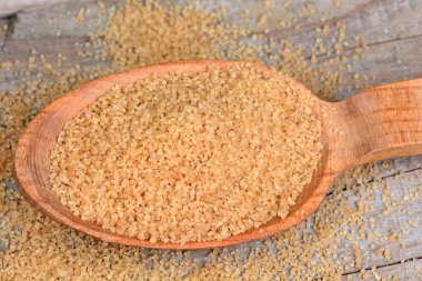 Bej bir tahta kaşık şeker