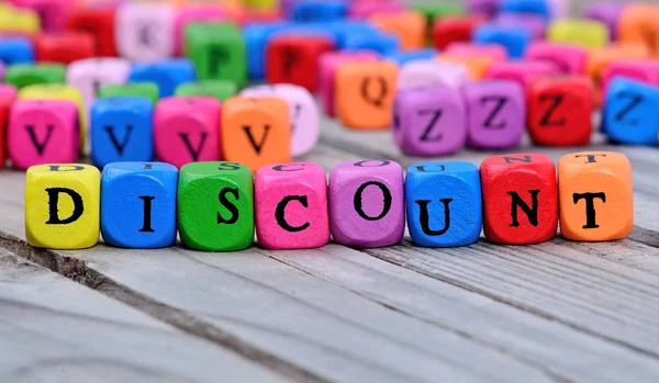 Discount word on table — Stock Photo, Image