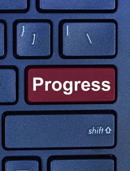 Palabra de progreso en el teclado del ordenador — Foto de Stock