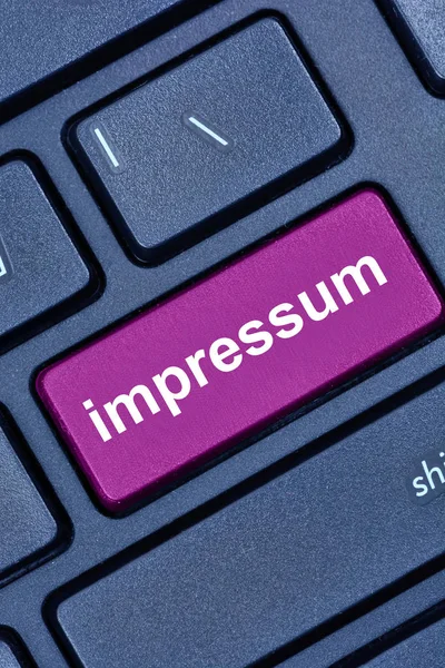 Impressum Wort auf der Computertastatur — Stockfoto