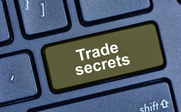 Trade secrets words on computer keyboard