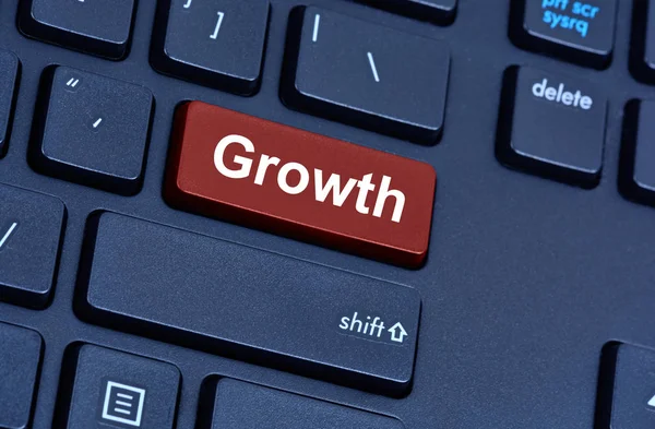 Slovo růst na tlačítko klávesnice počítače — Stock fotografie