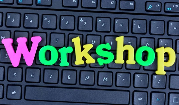 Workshop word on computer keyboard