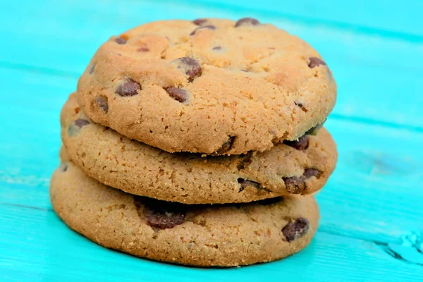 A cookie-kat a fából készült asztal csoport — Stock Fotó