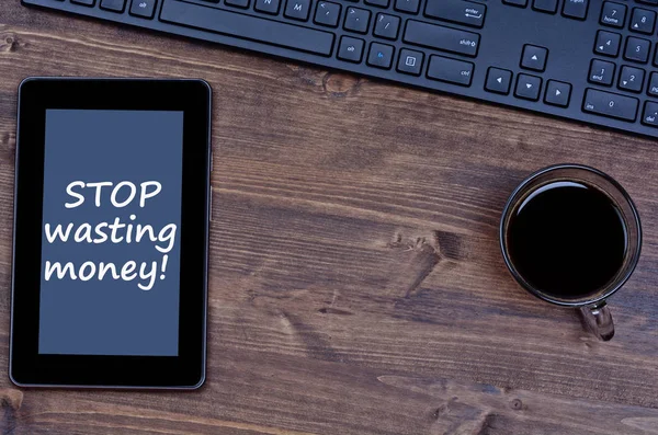 Text Stop wasting money on digital tablet — Stock Photo, Image