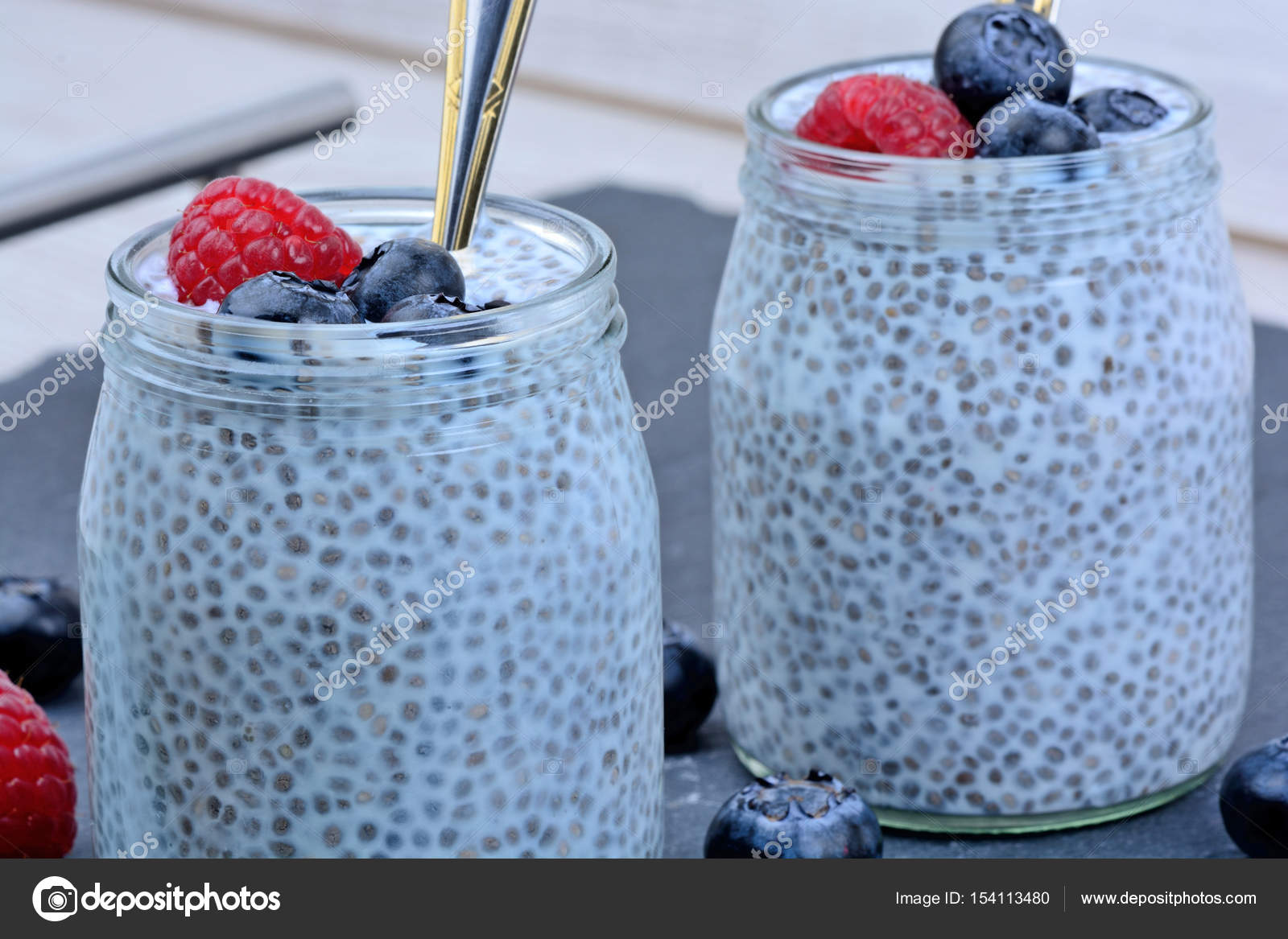 Chia seeds with coconut milk and berries — Stock Photo © deeaf 154113480