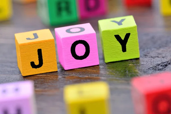 Joy word on table — Stock Photo, Image