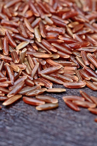 Group of red rice on table