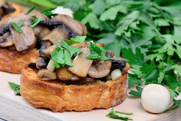 Bruschetta with mushroom and garlic — Stock Photo, Image