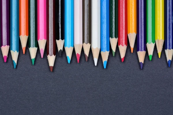 Colorful pencils on black background — Stock Photo, Image