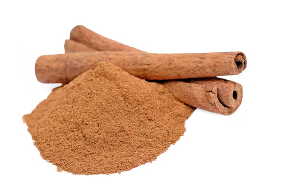 Cinnamon powder and sticks on white background — Stock Photo, Image
