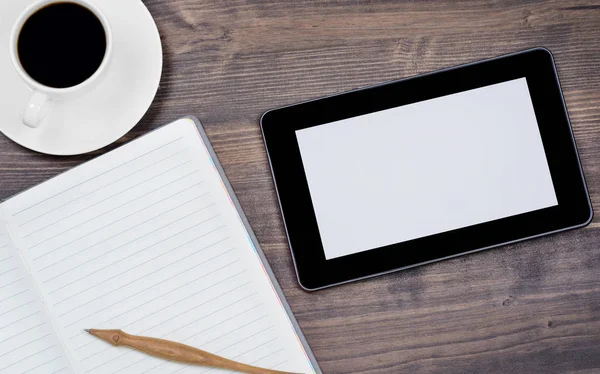 TabletPC och en kaffe och anteckningsbok med penna på kontoret — Stockfoto