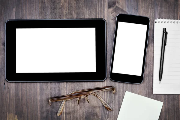 Desktop mix with notepad, pen and eyeglasses on a wood backgroun — Stock Photo, Image