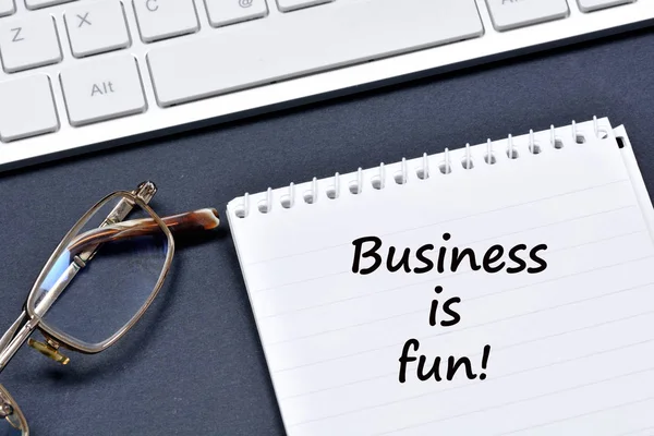 Business is fun text on notebook — Stock Photo, Image