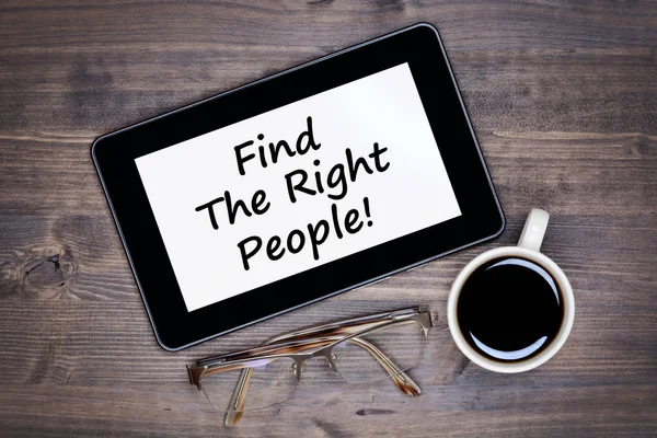 Find the right people! Text on tablet device on table