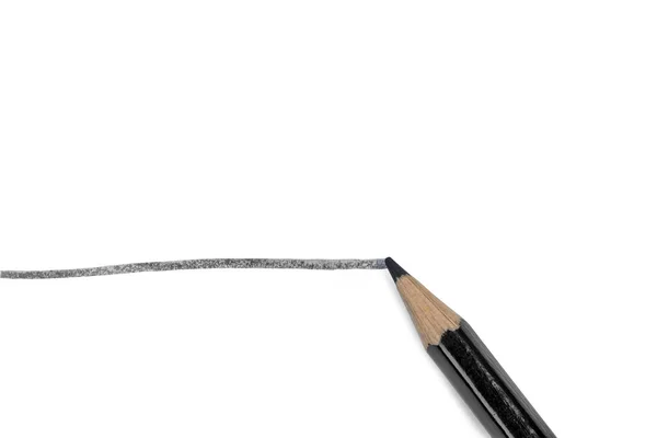 Black pencil on a white background — Stock Photo, Image