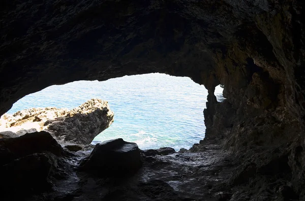Cave near the church at Cape Cavo Greco. Island of Cyprus, the Mediterranean Sea. 