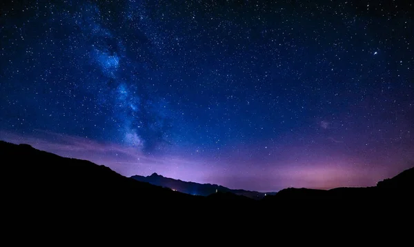 Night sky stars milky way blue purple sky in starry night — Stock Photo, Image