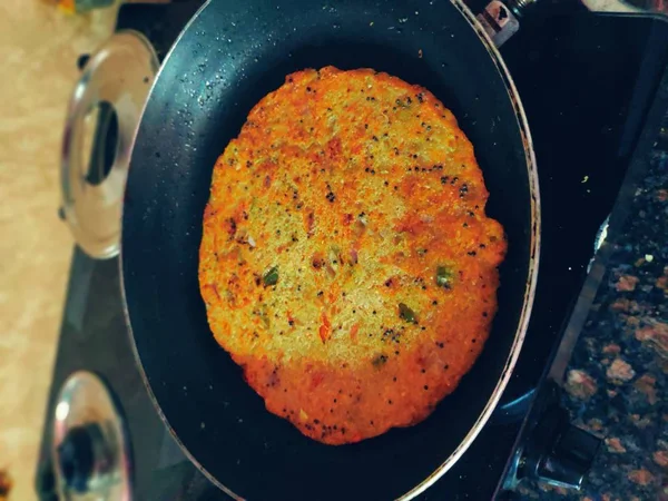 Handvo is a vegetable cake originating from the Gujarat or Gujarati snack cake. selective focus