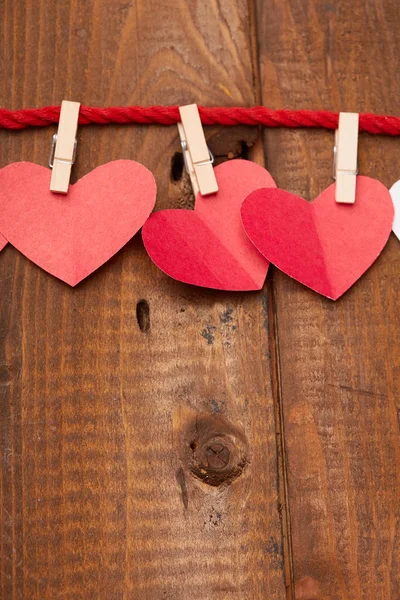 Paper hearts on clothespins — Stock Photo, Image