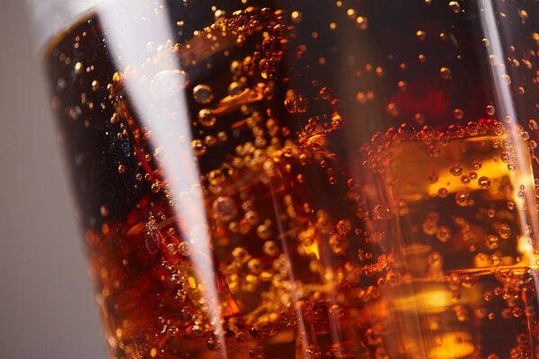 whiskey with cola with ice closeup