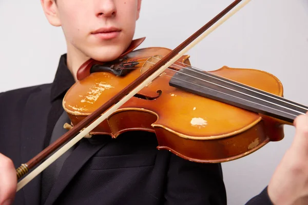 Young man with a violin — Stock Photo, Image